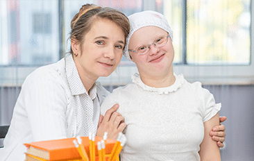 An NDIS client receiving help with household Tasks with one of our disability support workers