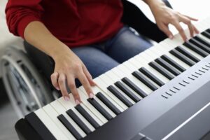 Disabled Woman Playing With A Keyboard