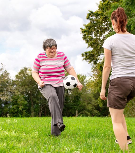 Women Playing Soccer in the Park — Disability Services in Toowoomba, QLD