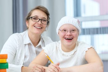 Mother and Girl Smiling — Disability Services in Cairns, QLD