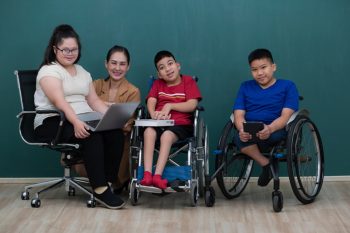 Kids With Their Teacher — Disability Services In Mackay, QLD