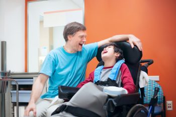 Father & Son Laughing Together — Disability Services in Toowoomba, QLD