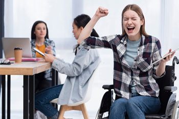 Woman in Wheelchair with Tablet — Point Care Pty Ltd in Gladstone, QLD